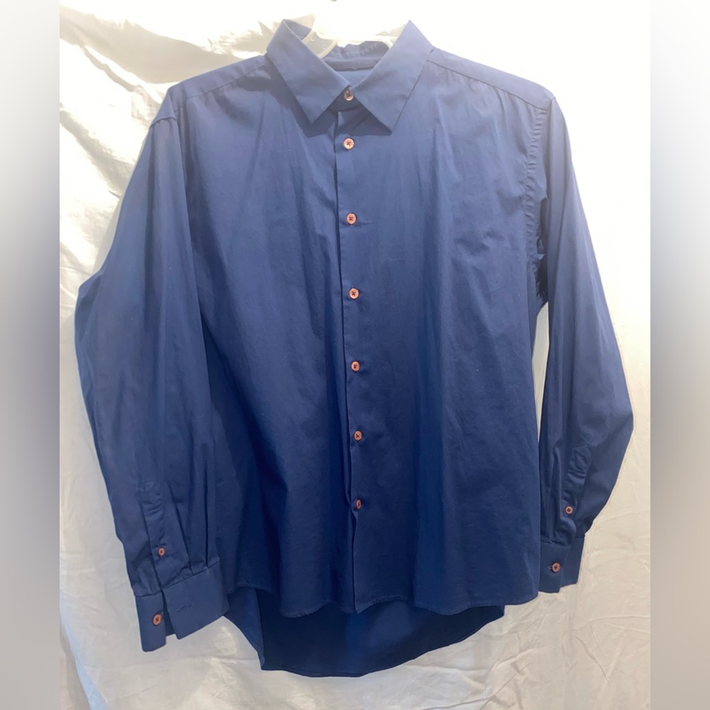 Dark blue button down dress shirt with contrasting buttons lightly used.